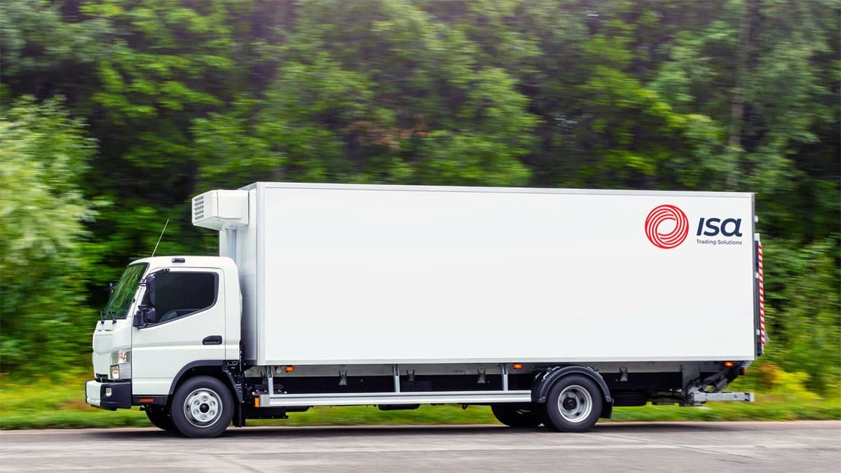 White truck on a road with the ISA Foods logo